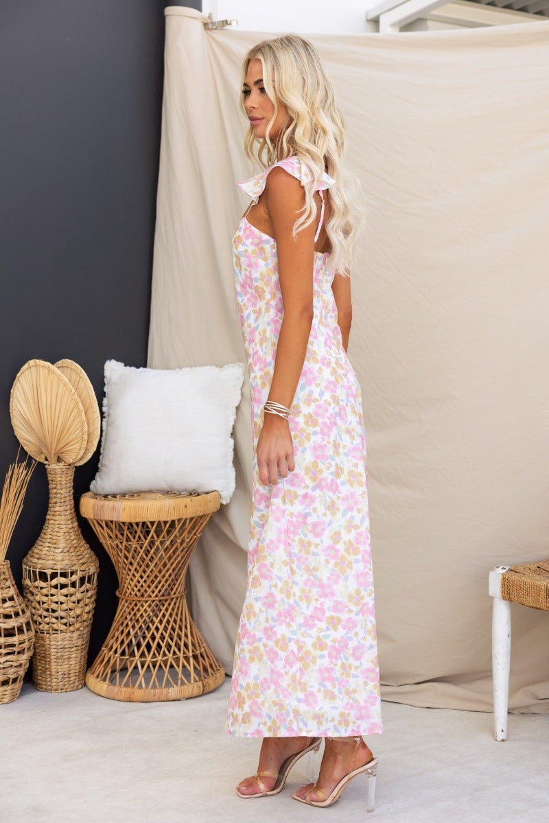 Kellana Midi Dress featuring floral print, adjustable ruffle straps, and a stylish side view, perfect for summer outings.