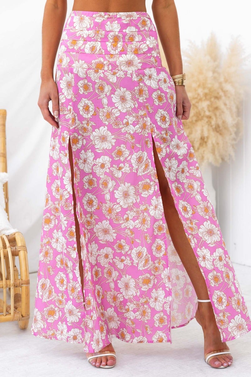 Floral print Last Summer maxi skirt in pink with high splits and mid-waist fit, ideal for warm weather outfits.