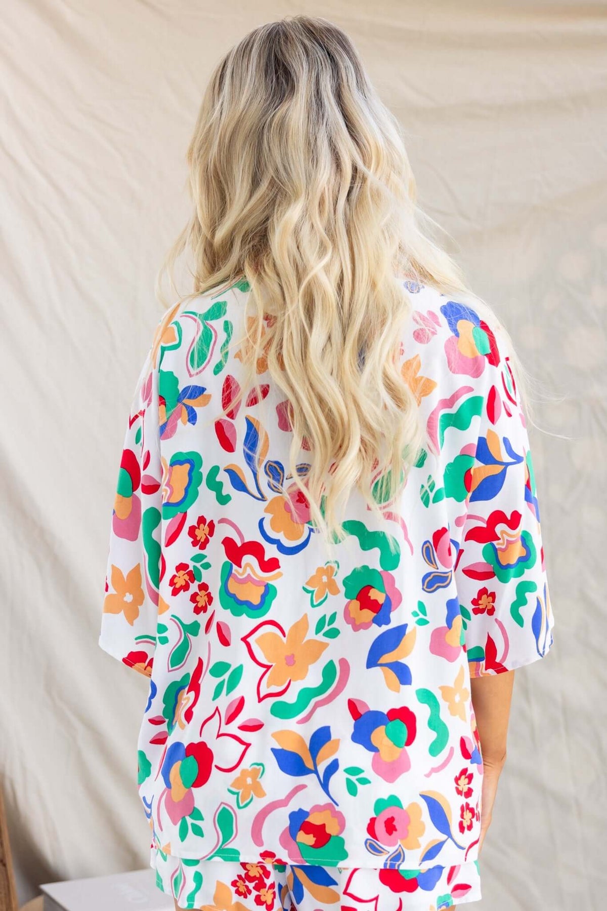 Colorful Bonito Shirt with floral design, featuring a relaxed fit and lightweight rayon material.