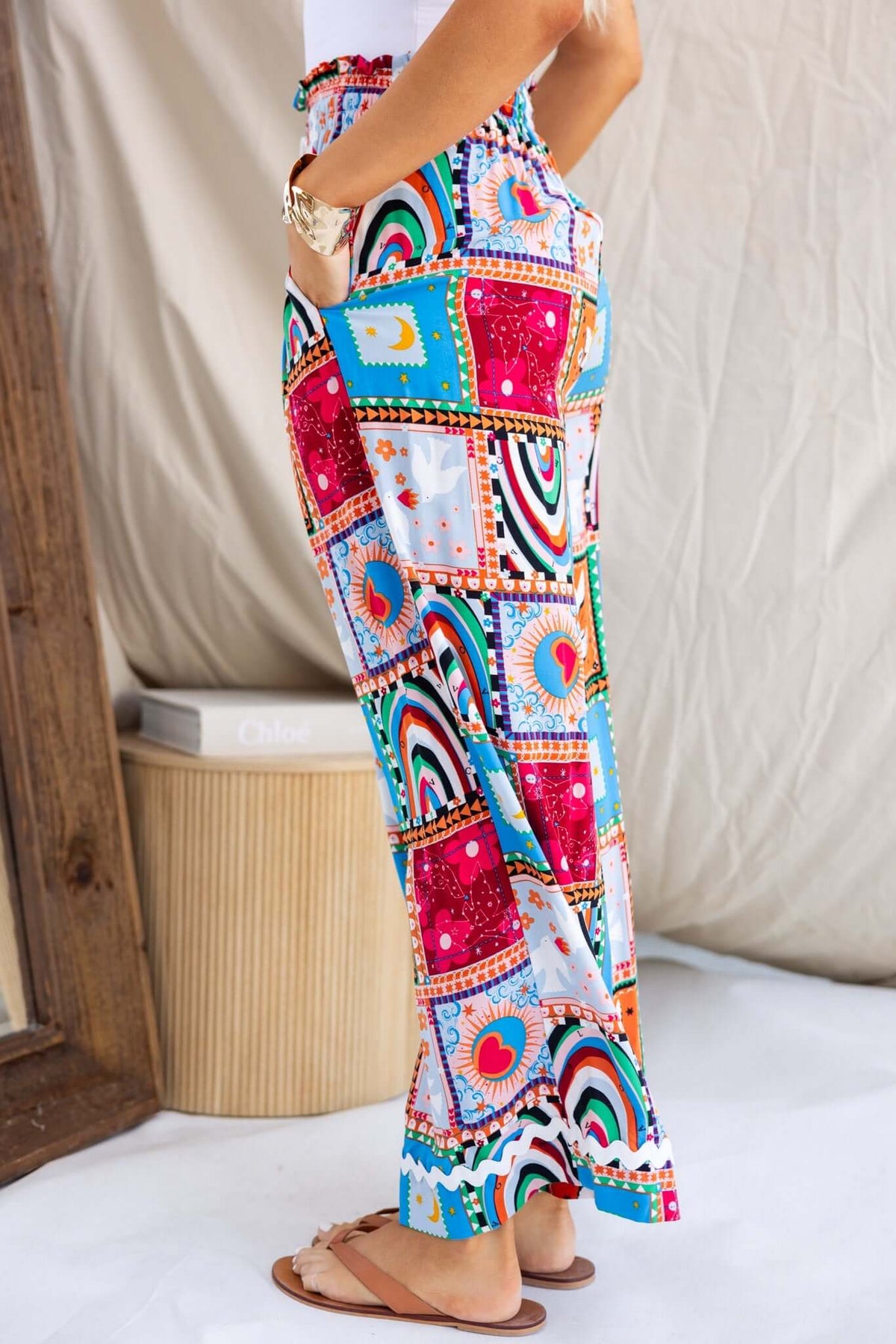 Colorful Maito Pants with patchwork design, featuring a mid-high waist, elastic waistband, and side pockets.