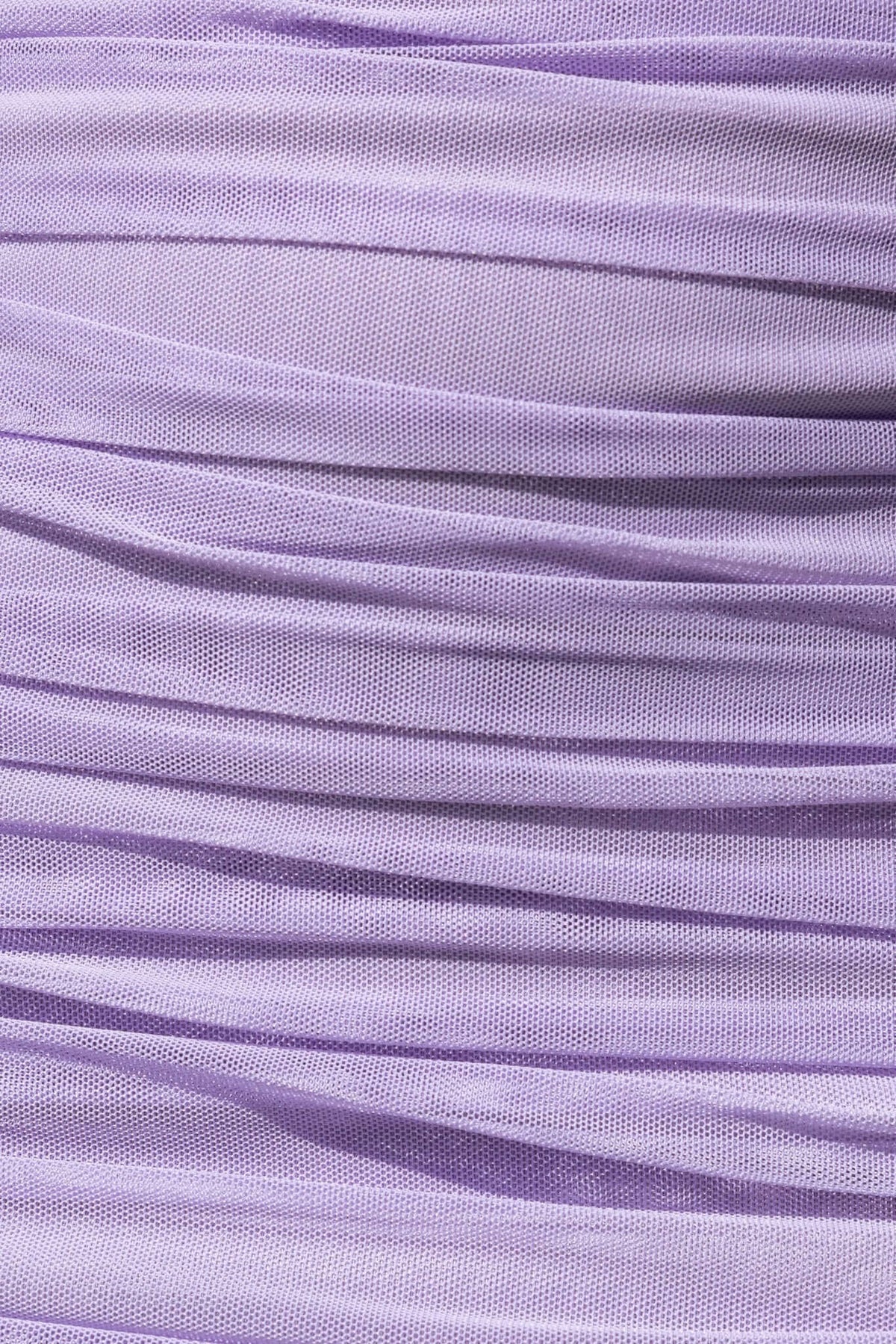 Close-up of textured lavender mesh fabric with ruching details, ideal for elegant garment design.