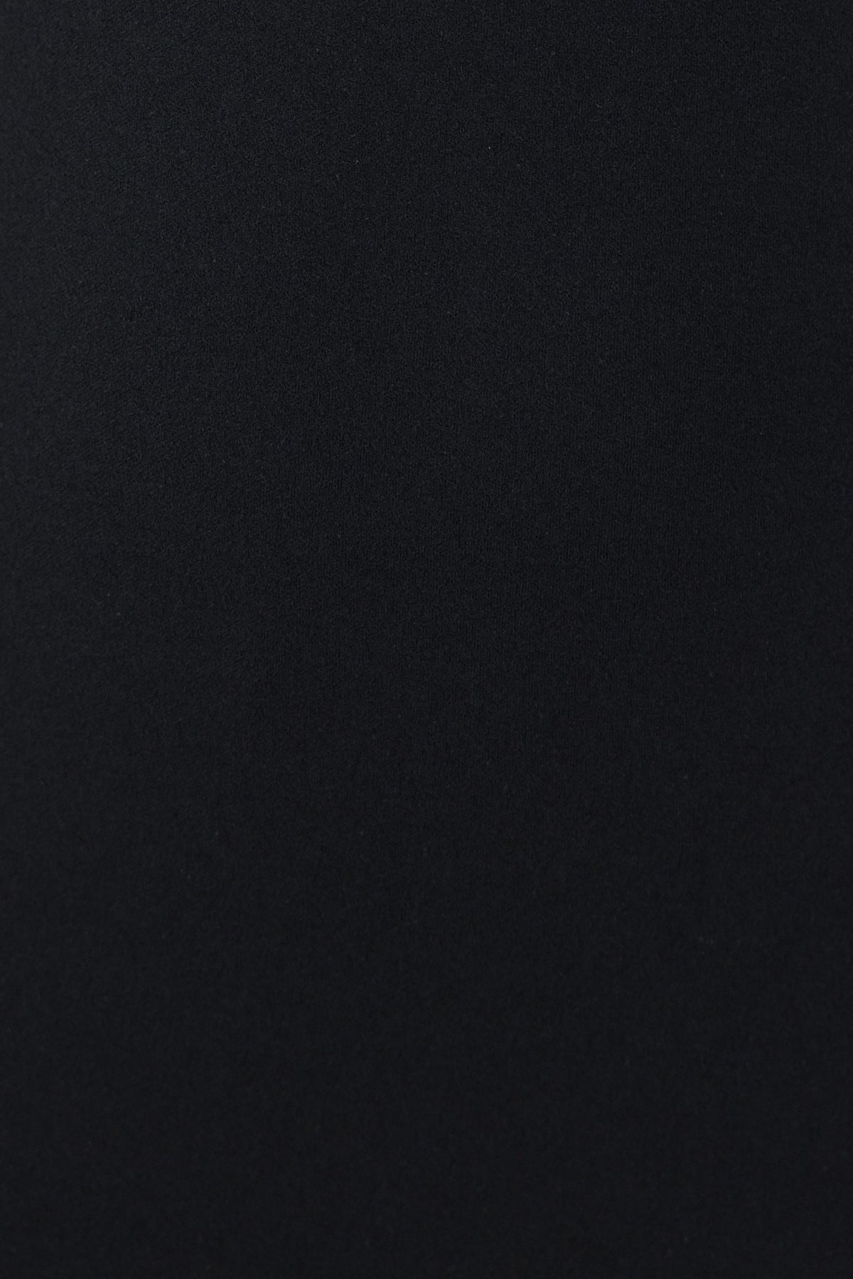 Close-up of the fabric texture of the Deona Maxi Dress in black crepe material.