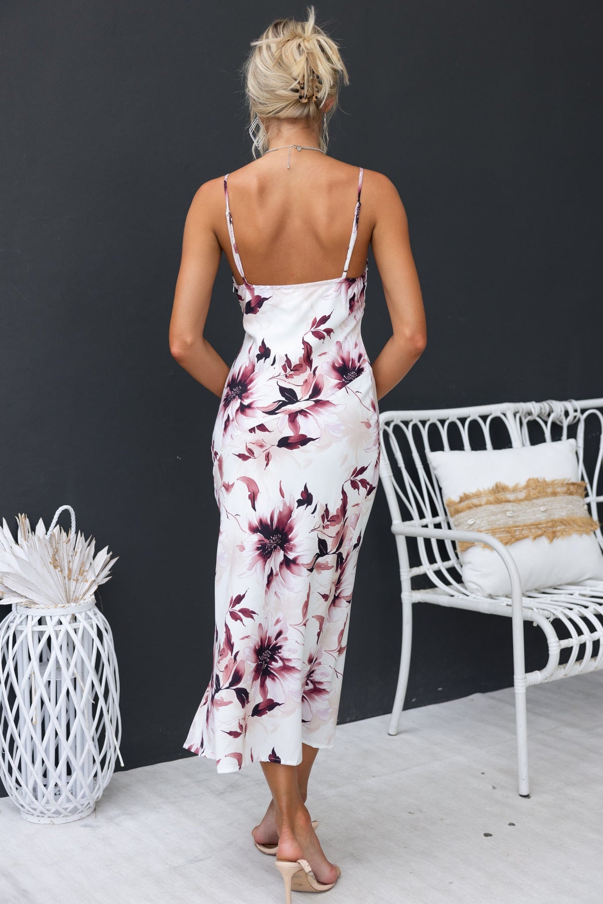 Back view of Briley Maxi Dress featuring floral print, adjustable straps, and mid-thigh lining