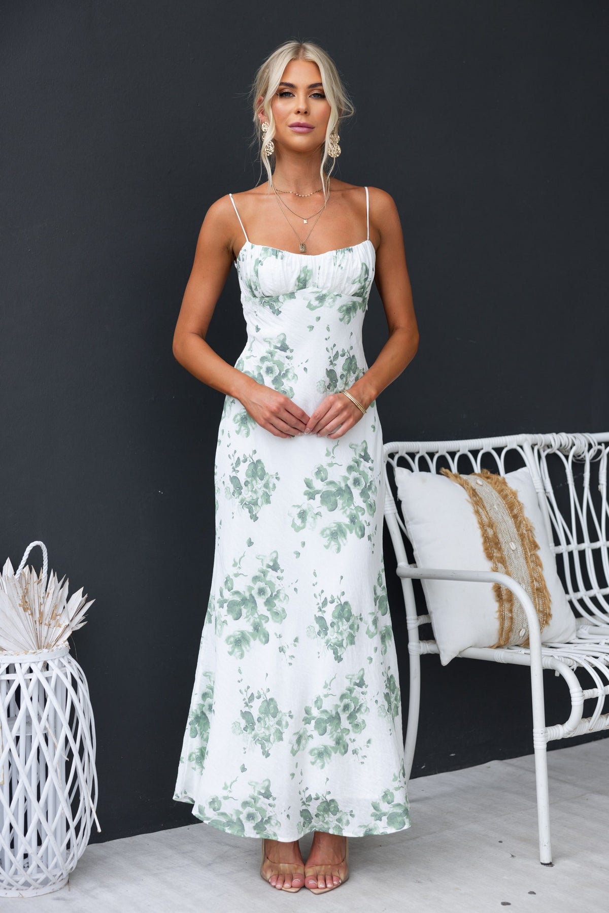 Freyda Maxi Dress with floral print, adjustable straps, and gathered bust, perfect for summer occasions.