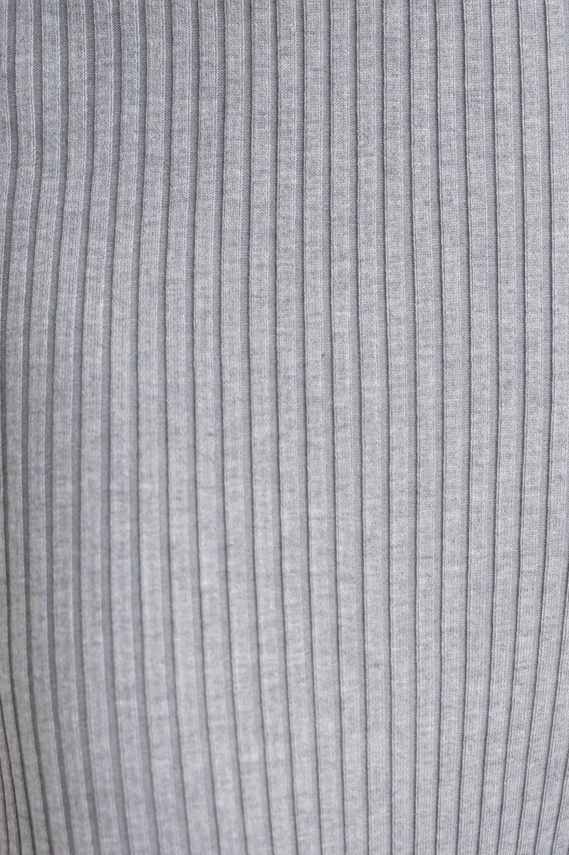 Close-up of a ribbed knit fabric in light gray, showcasing the texture of the Keshy Maxi Dress.