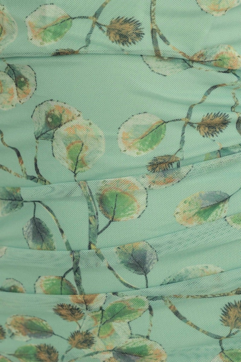 Close-up of leafy mint fabric on Brailey Midi Dress, showcasing gathered detail and mesh overlay.