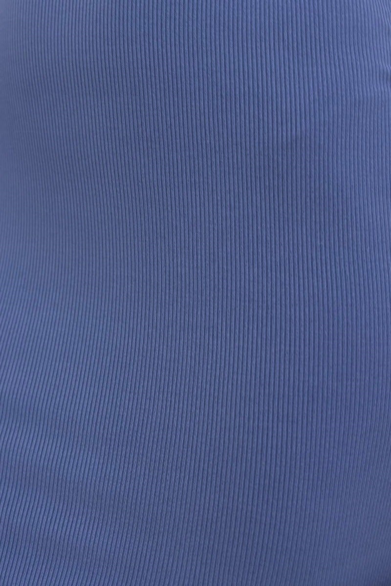 Close-up of ribbed blue fabric, showcasing texture for Fernanda Midi Dress made of stretchy polyester and spandex.