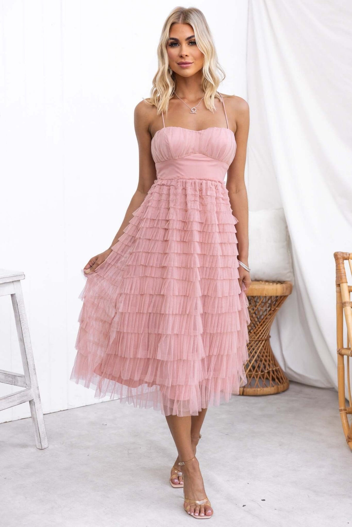 Vittoria Midi Dress in blush pink with tiered tulle design and adjustable straps, perfect for special occasions.