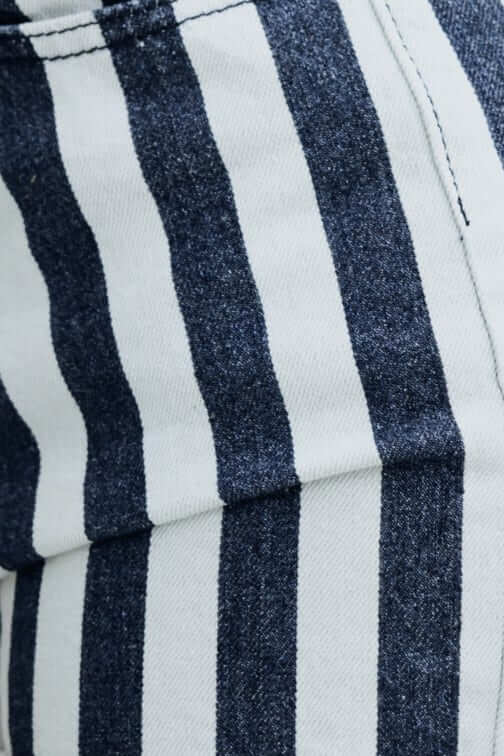 Close-up of Juno Denim Shorts featuring a blue and white striped pattern in a soft 100% cotton fabric.