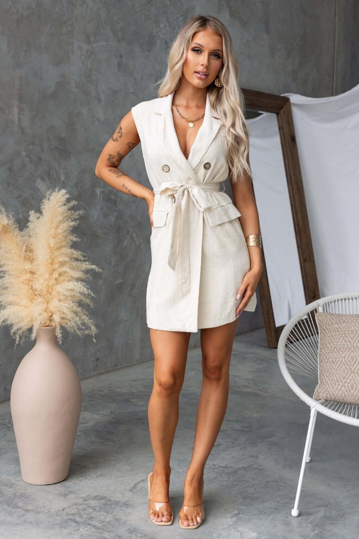 Stylish Stowe Dress featuring a collar, button-up front, and removable tie, perfect for a relaxed summer look.