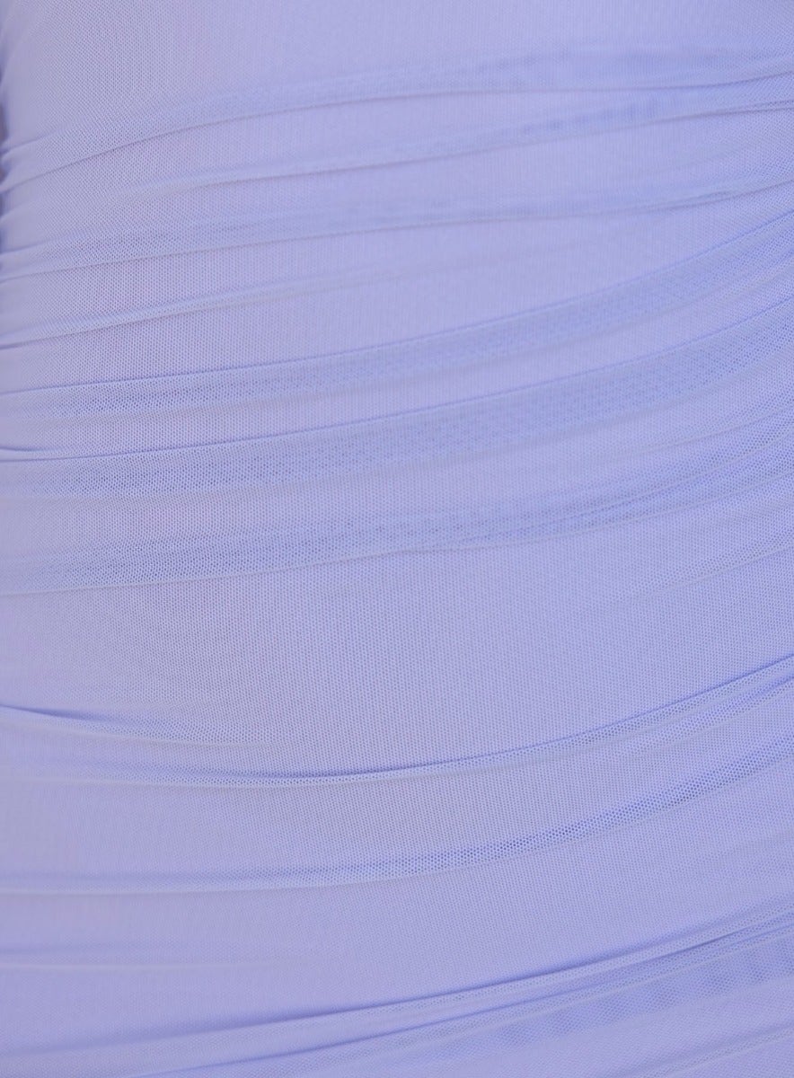 Close-up of the ruching detail on a lavender midi dress, showcasing mesh overlay and soft fabric texture.
