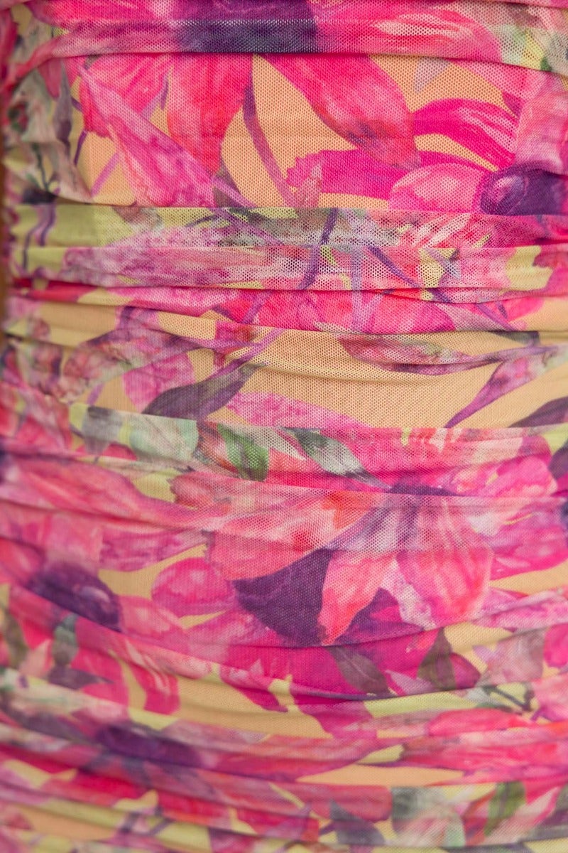 Close-up of colorful floral fabric with ruching details, perfect for the Azriel Midi Dress.