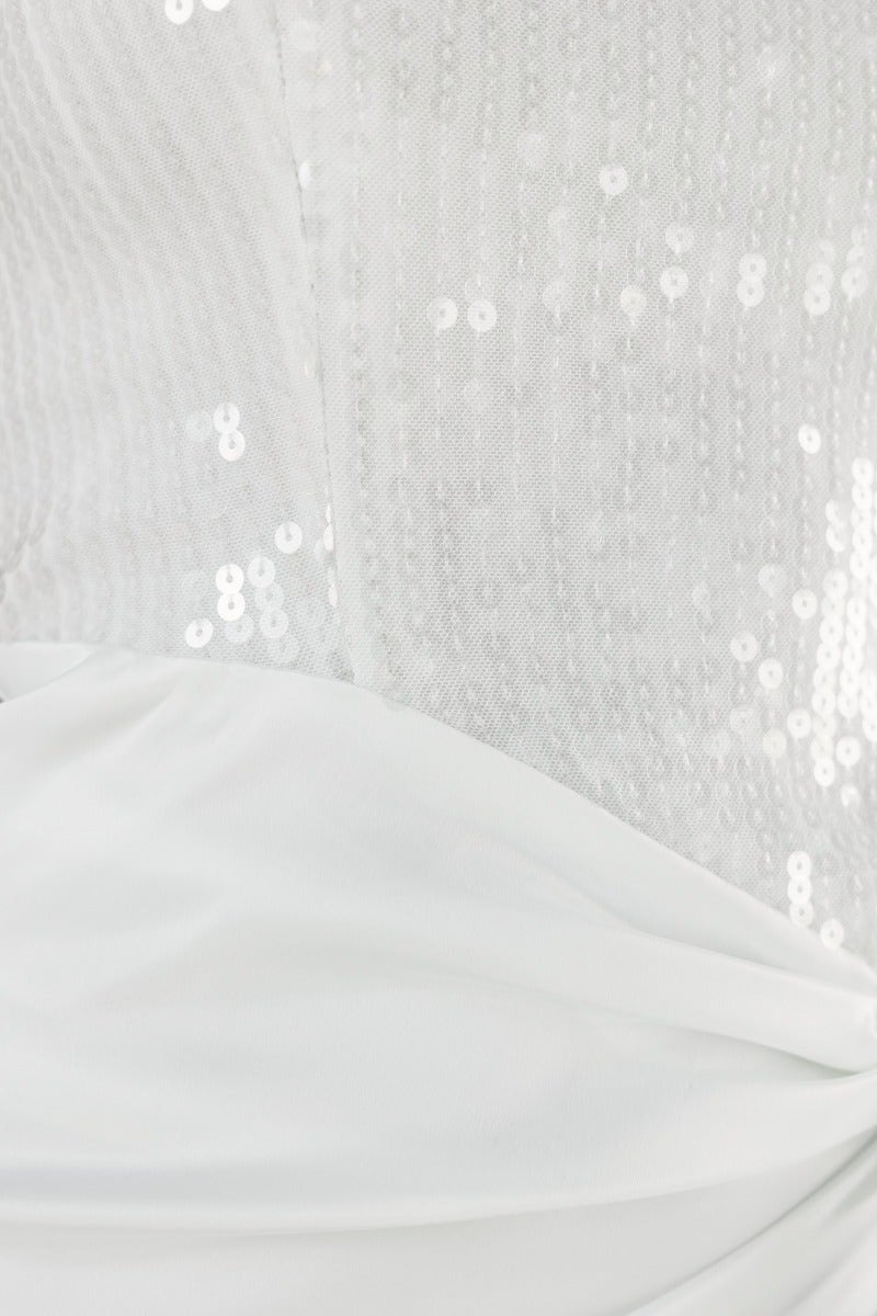 Close-up of satin midi dress bodice with sequins, showcasing tie detail and soft draping.