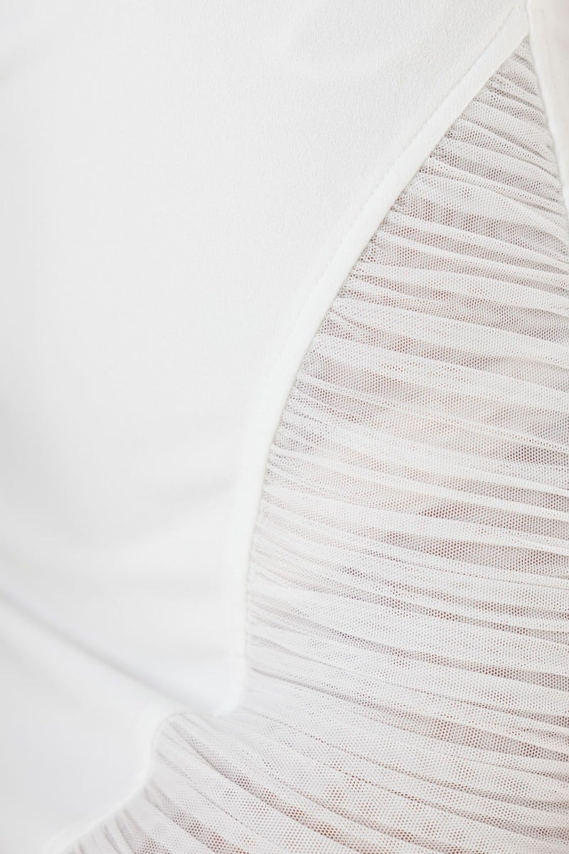 Close-up of mesh detail on the Roman Midi Dress, showcasing the elegant design and fabric texture.