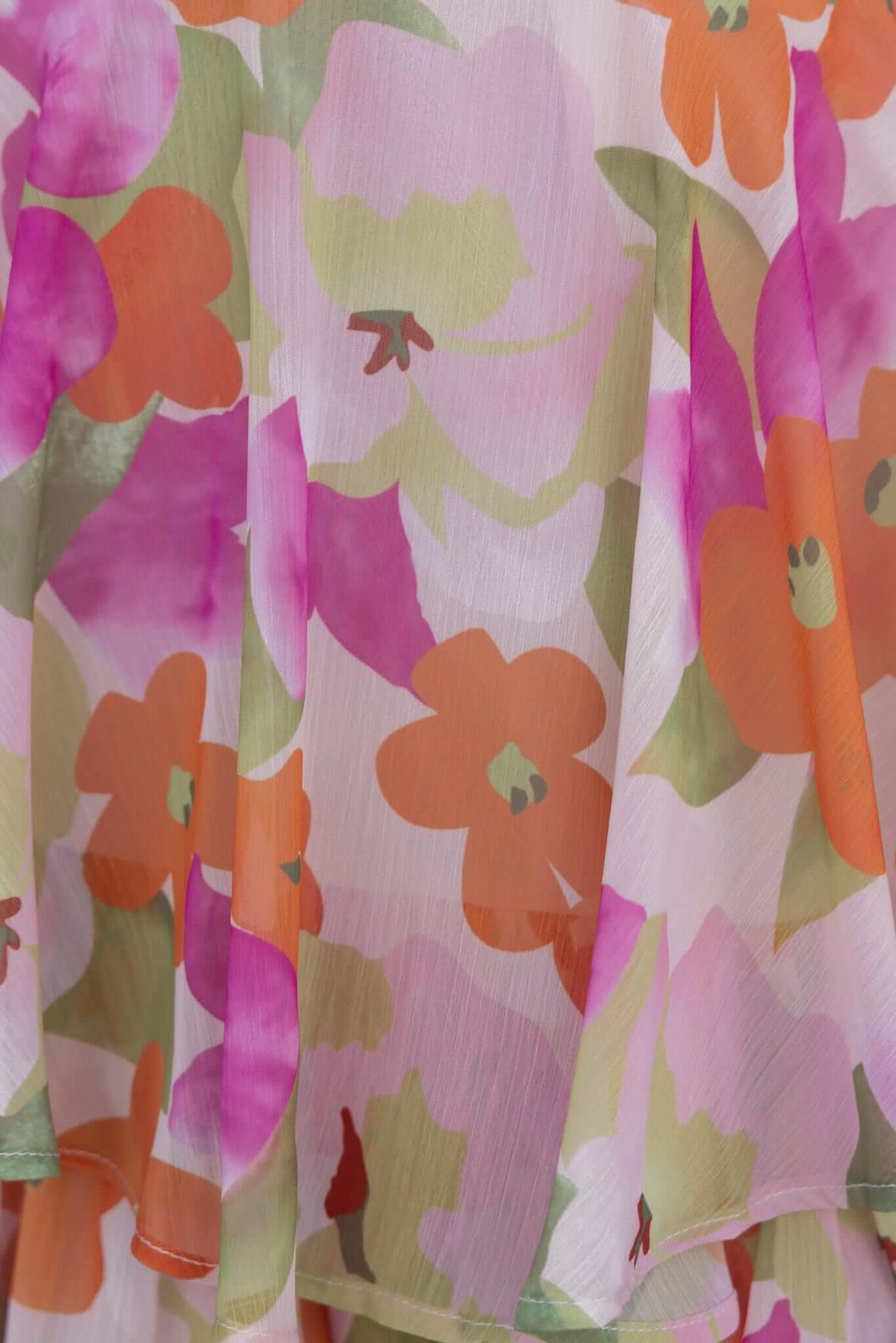 Colorful floral pattern on lightweight fabric, perfect for a stylish playsuit like the Cyra Playsuit.
