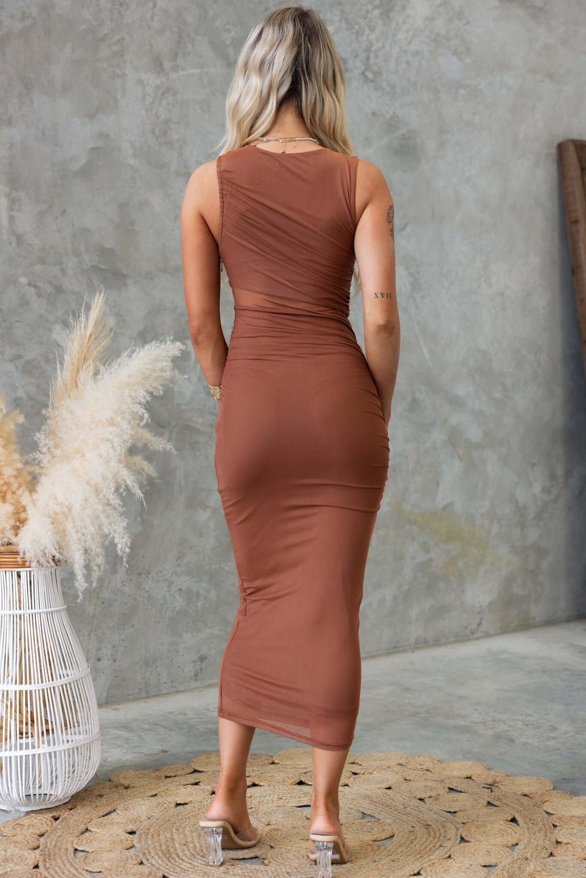 Back view of Zenallo Midi Dress in brown, showcasing stretchy mesh material and sleek silhouette.