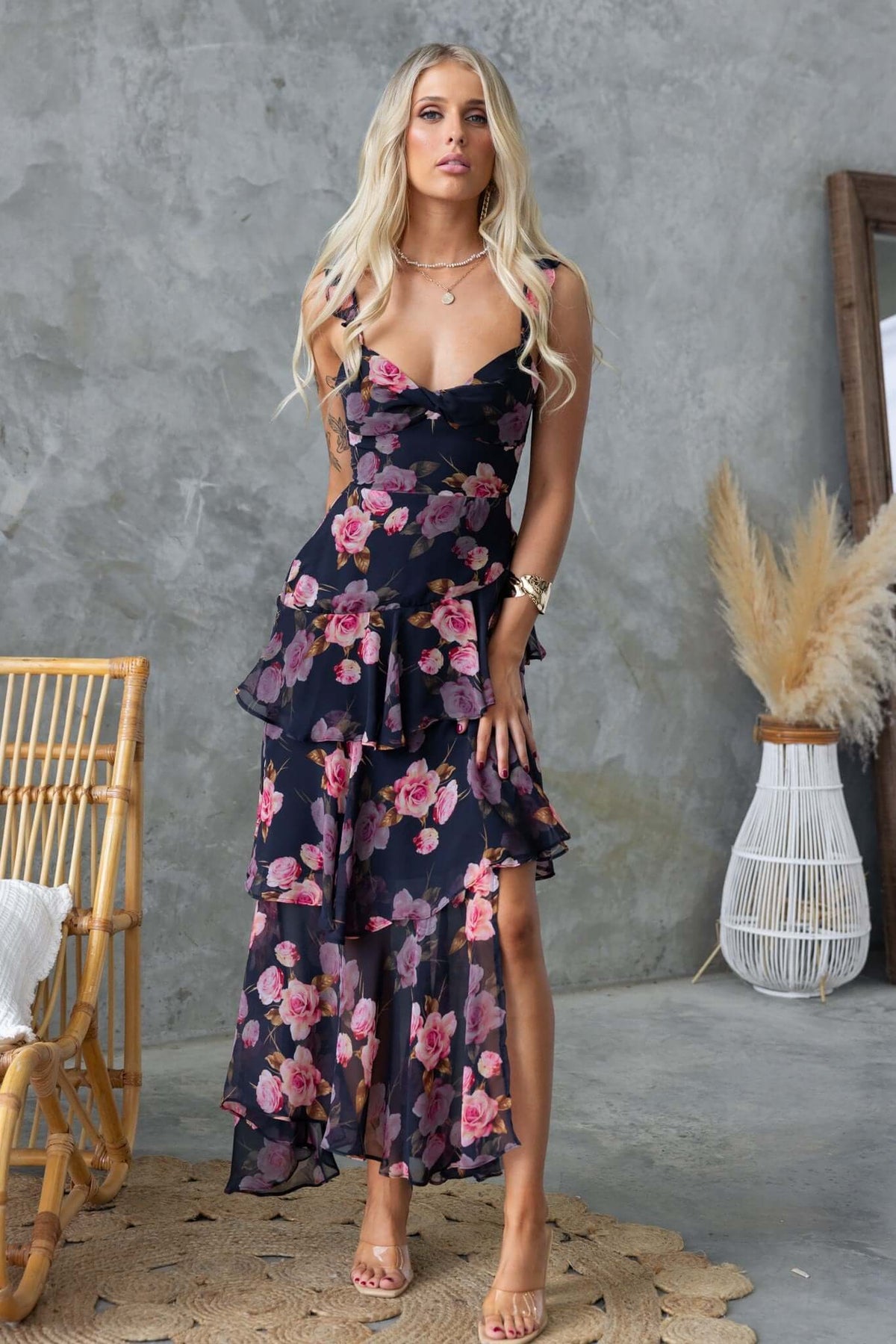 Floral print Klaudia Maxi Dress with adjustable straps, front split, and chiffon material, styled against a neutral backdrop.