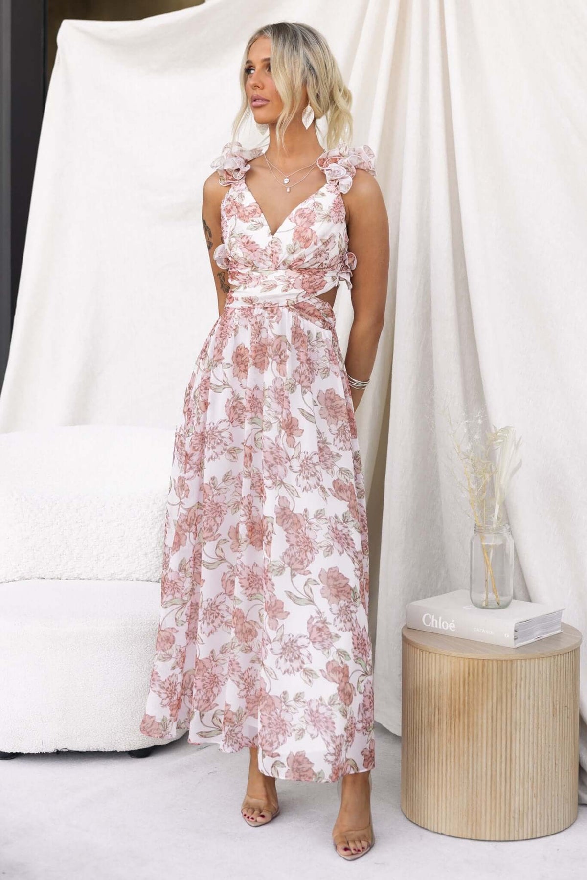 Luciana Maxi Dress featuring V-neckline, ruffle straps, and floral print in lightweight chiffon.