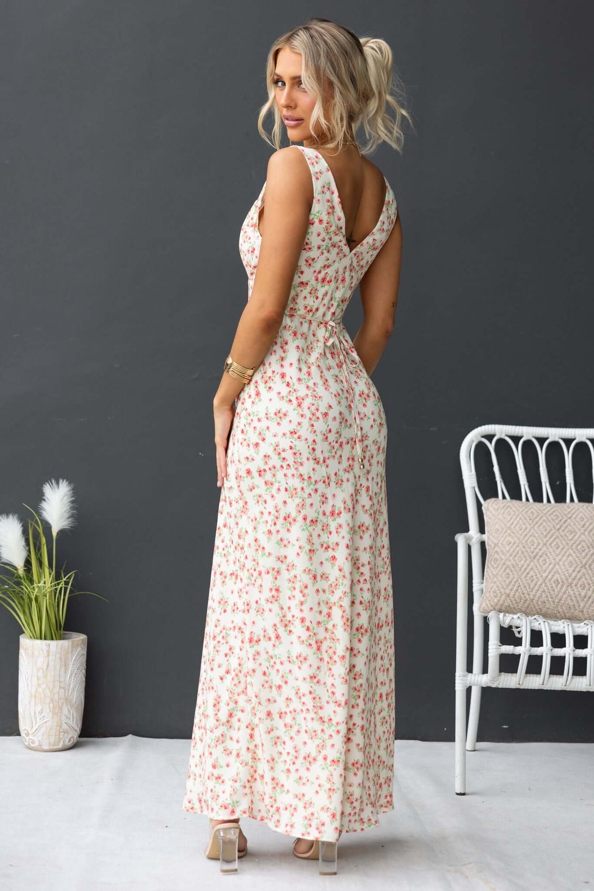 Joliet Maxi Dress featuring a floral print, back view, and side pockets, perfect for summer styles.