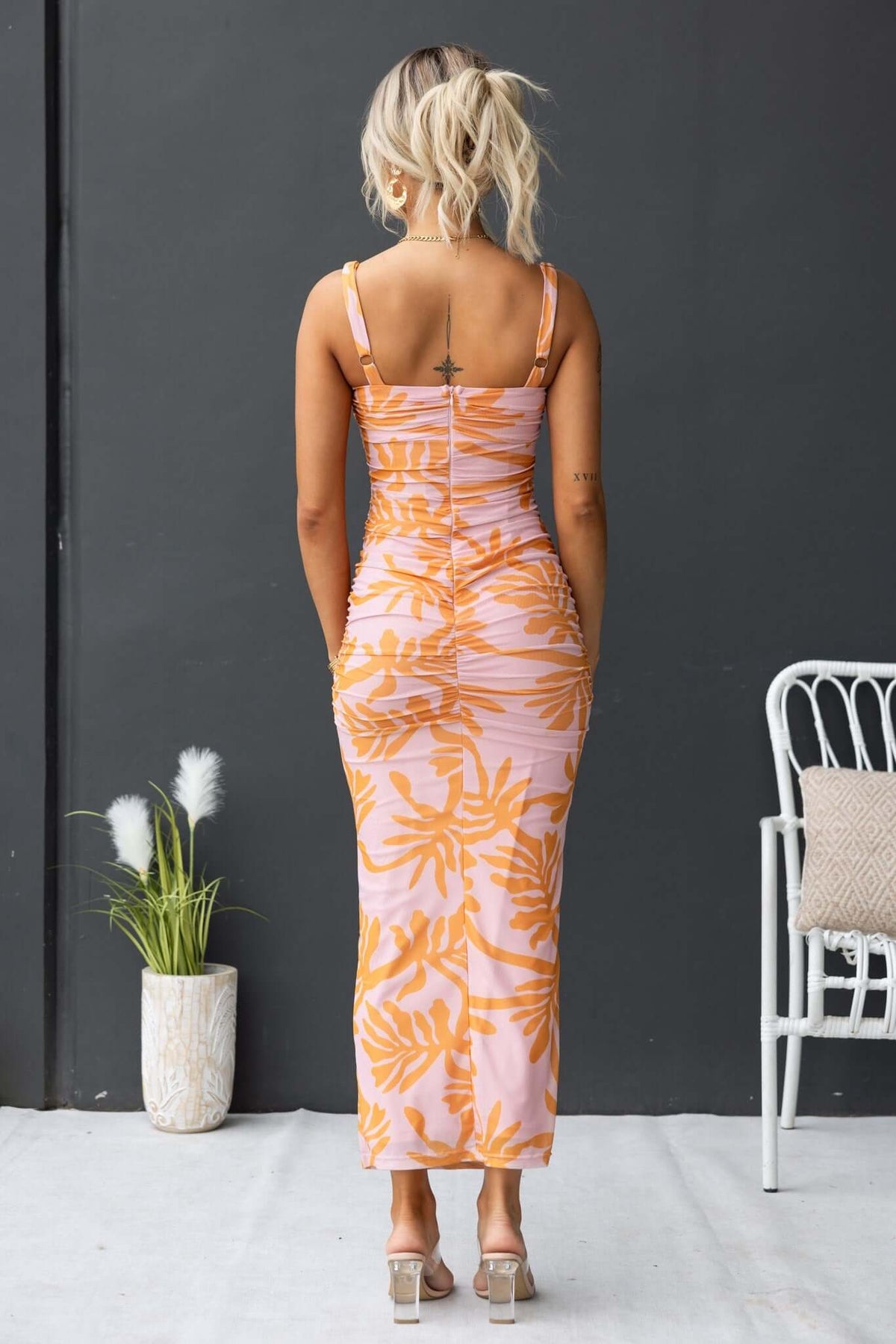 Back view of Giorgi Maxi Dress featuring floral print, adjustable straps, and a fitted silhouette.