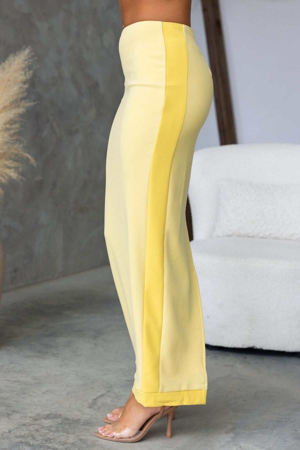 Rianna Maxi Skirt in yellow with side stripe, featuring a mid-high waist and split for added style.