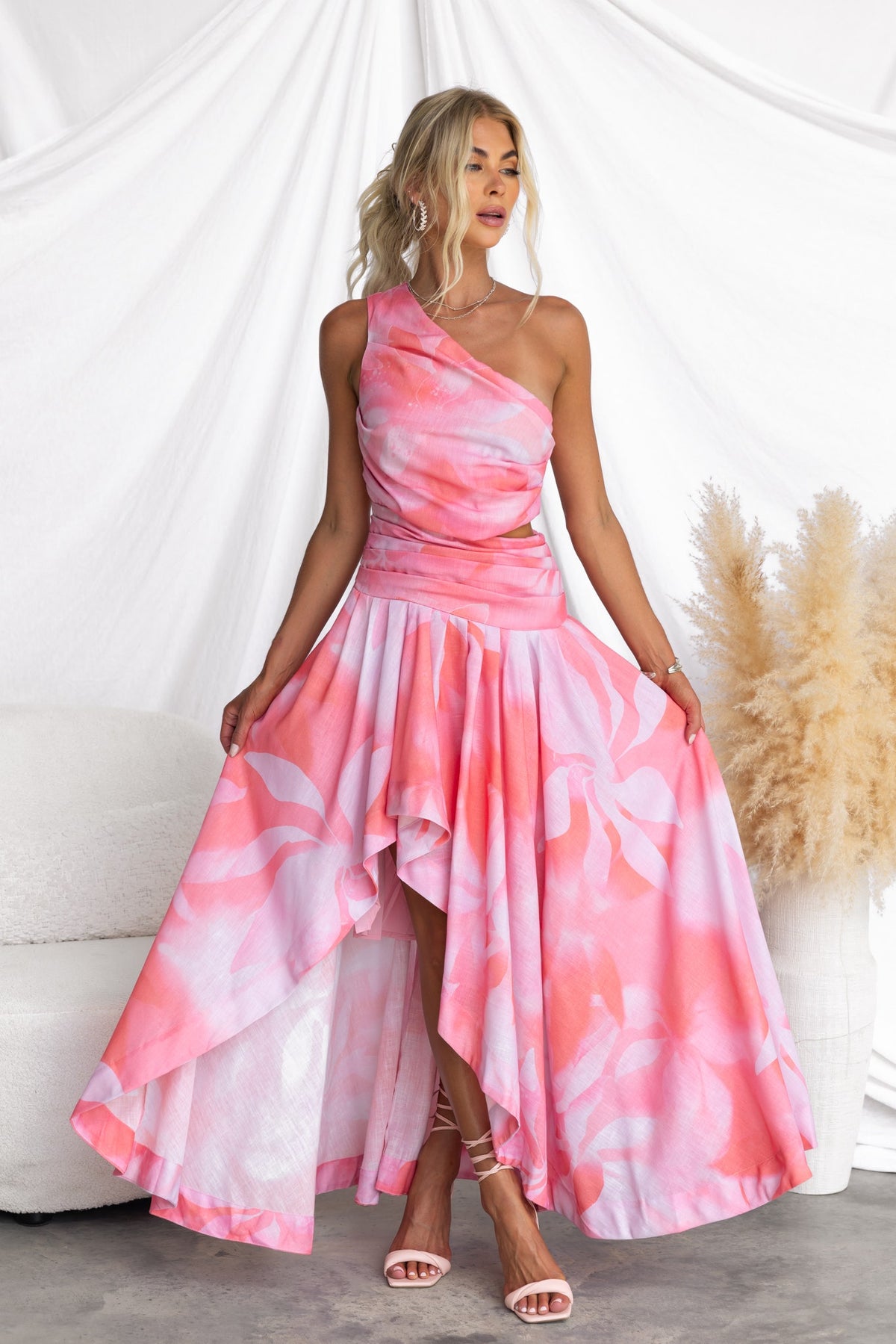 Multi-colour Horizons Maxi Dress with one-shoulder neckline and asymmetrical hemline, styled for summer occasions.