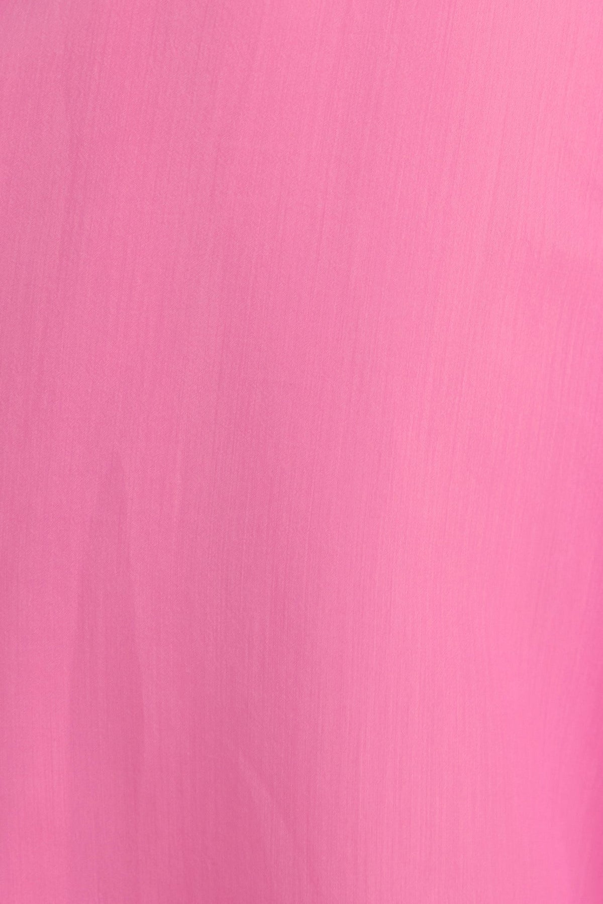 Close-up of soft pink chiffon fabric, showcasing delicate texture ideal for a stylish midi dress.