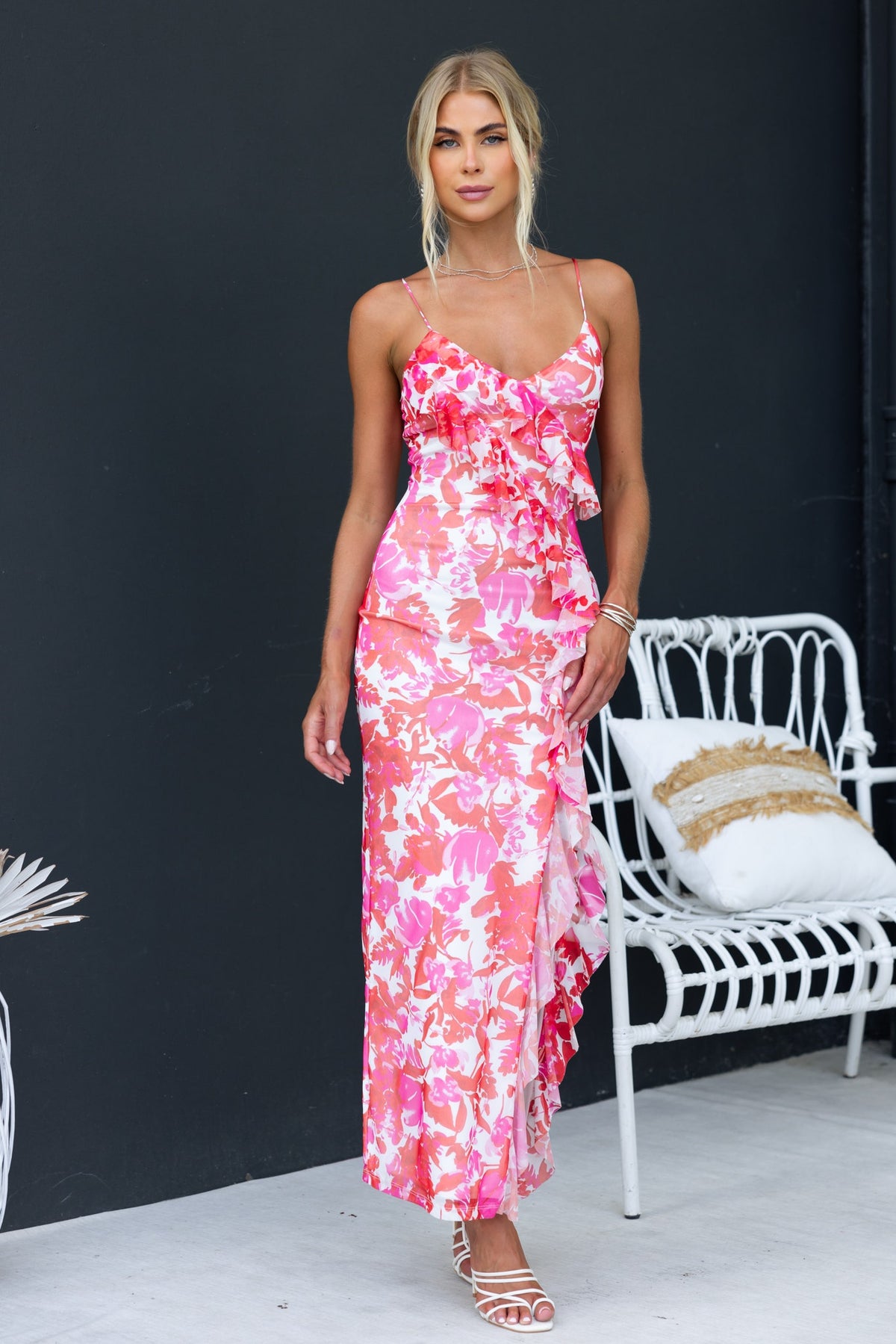 Jillian Maxi Dress featuring floral print, adjustable straps, and ruffle detailing, perfect for summer occasions.