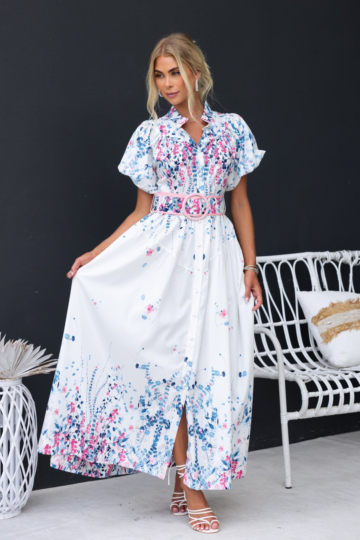 Model wears Younger Now Maxi Dress, a floral print maxi with a button-up front and removable belt.