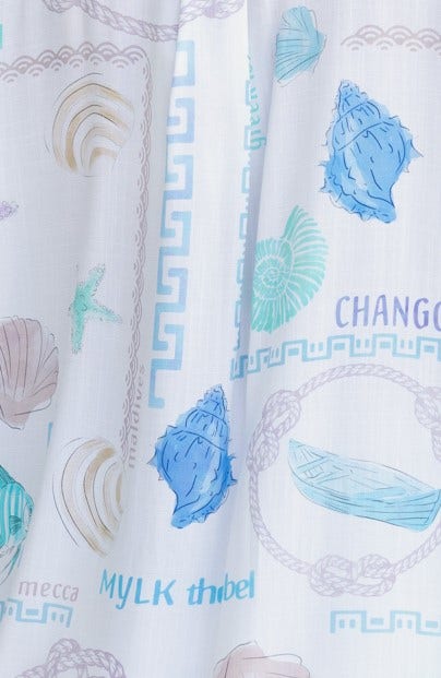 Abstract print featuring seashells and nautical designs, ideal for Oceania Shorts by Mylk the Label.