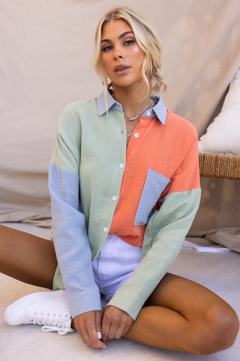 Atticus Top in cotton featuring a collared button-up design with a breast pocket, lightweight and textured fabric.