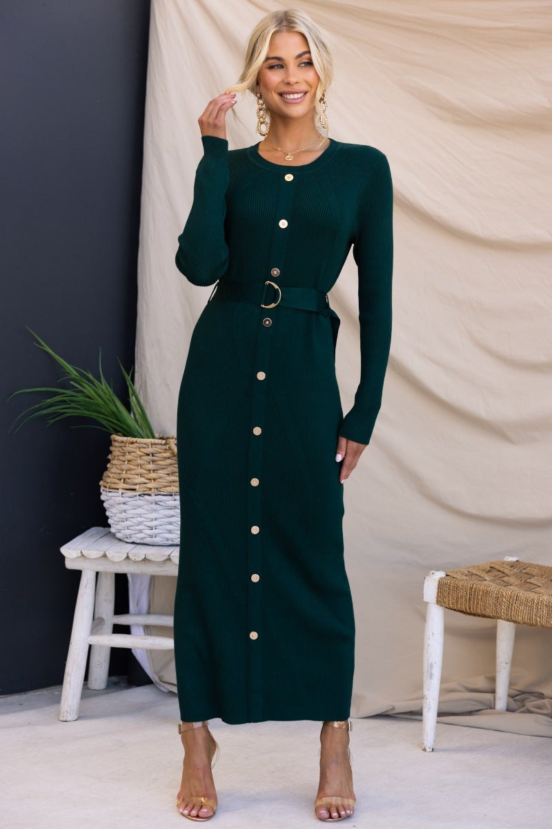 Dark green ribbed maxi dress with round neckline and faux button-up front, featuring a removable belt.