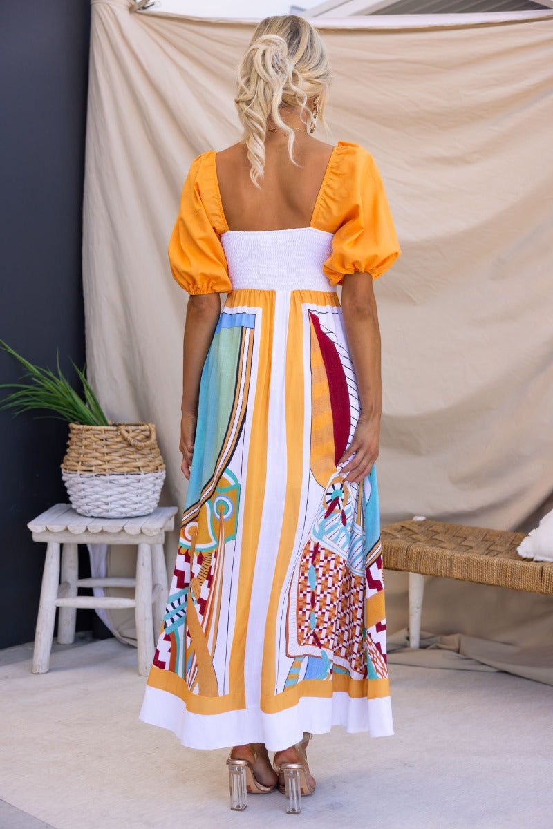 Turner Maxi Dress in multi-colour with square neckline and elastic sleeves, featuring artistic patterns and a breathable design.
