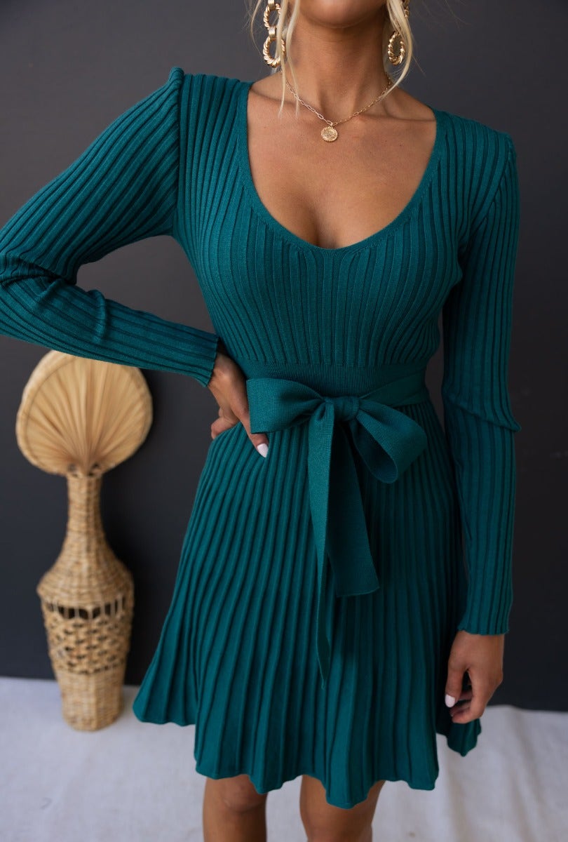 Cadello Dress in teal ribbed knit with round neckline and removable belt, showcasing a stylish fit.
