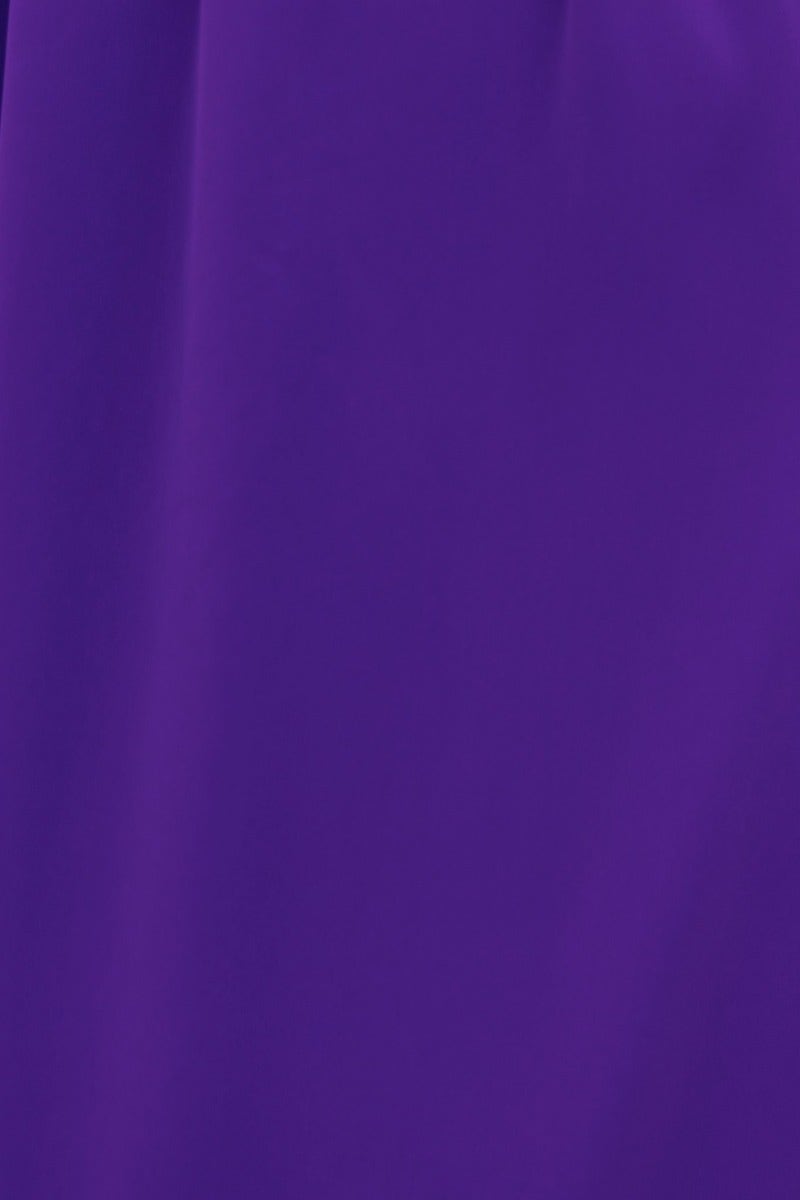 Close-up of Alizzie Midi Dress in vibrant purple fabric, showcasing its smooth texture and rich color.