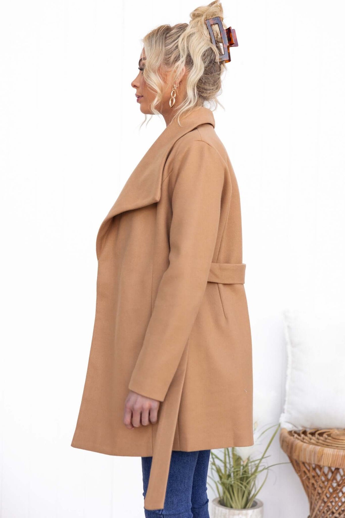 Side view of a stylish beige Jean Coat with a removable collar, perfect for a casual look.