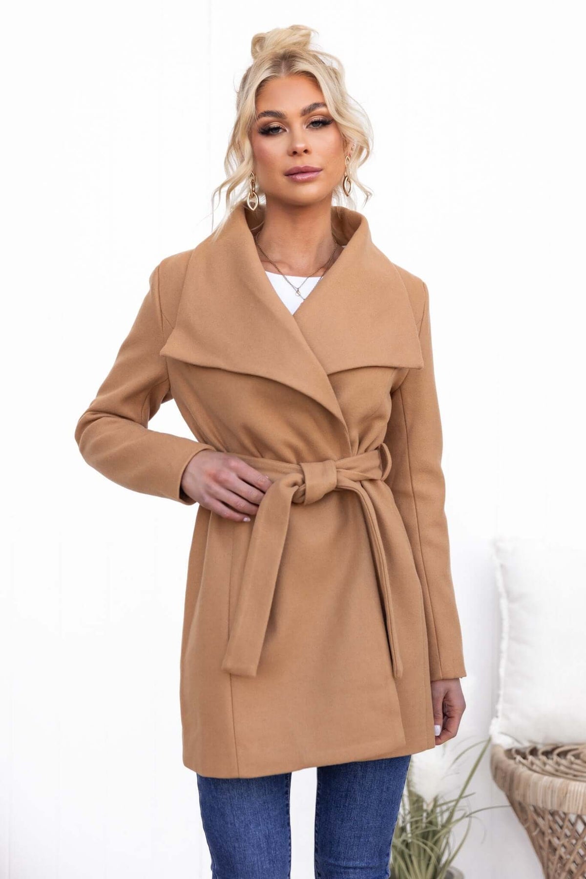 Stylish Jean Coat in camel color, featuring a removable tie, collar, and standard fit, worn by model.