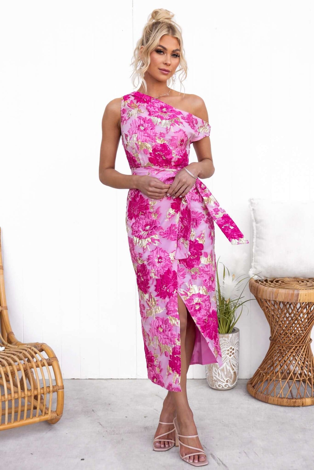 Bettina Midi Dress in pink floral print with asymmetric neckline and tie waist detail
