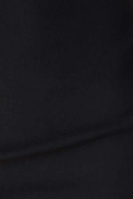 Close-up of black fabric texture of Idol Top with stretch material.