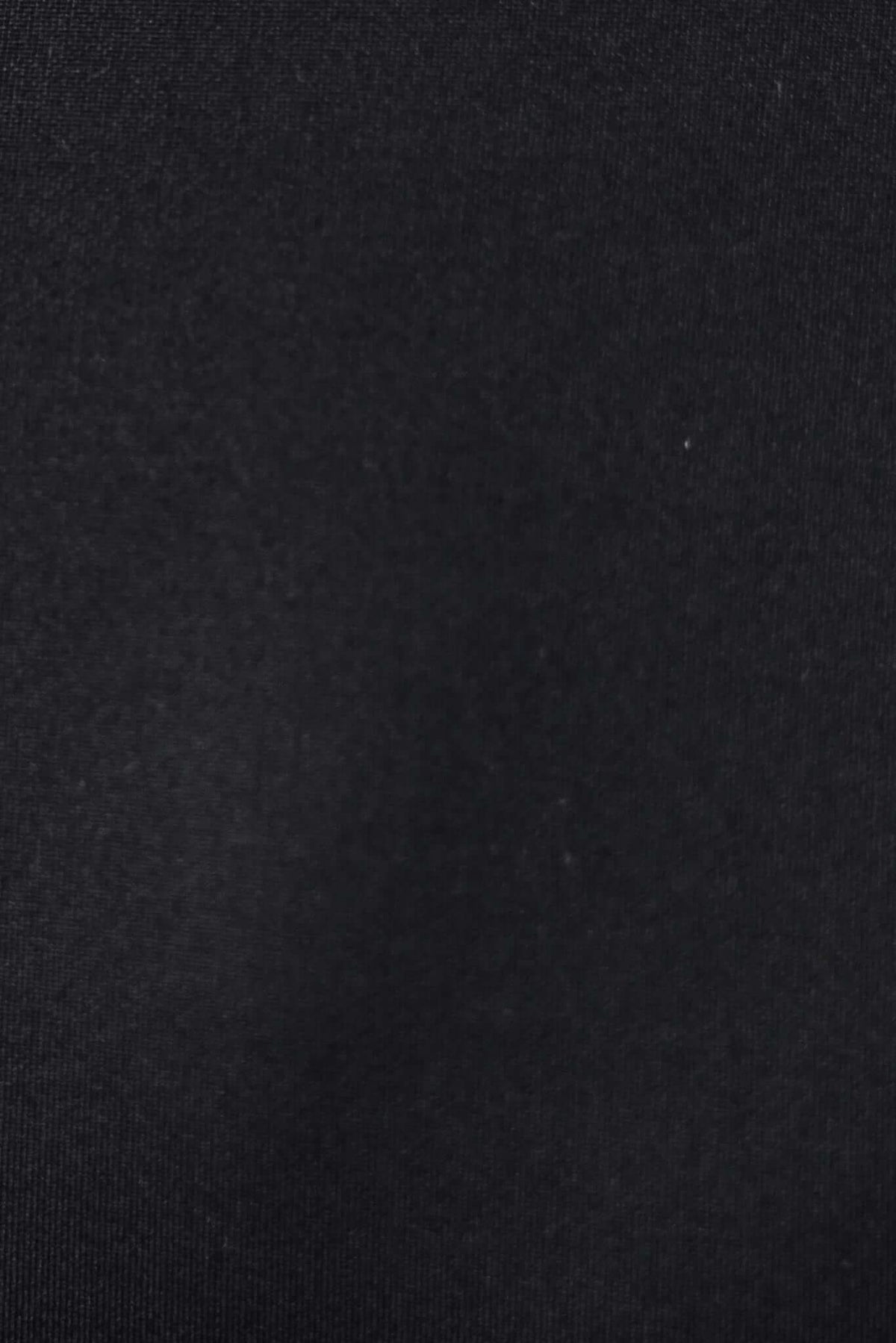 Close-up of black fabric showing thick structured material with subtle texture, ideal for stylish bodysuits.