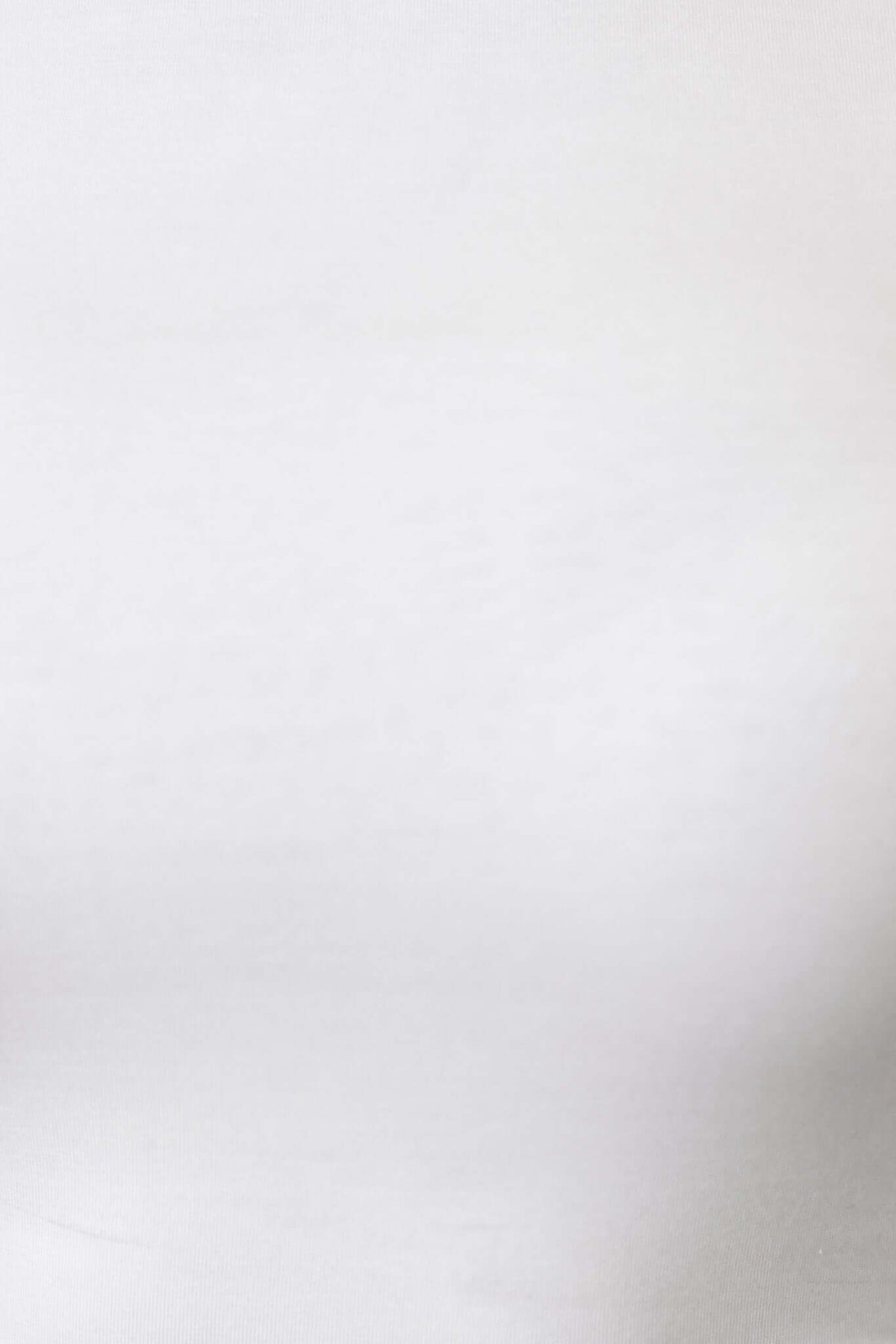 Close-up of smooth, neutral fabric texture, ideal for clothing design and textile details.