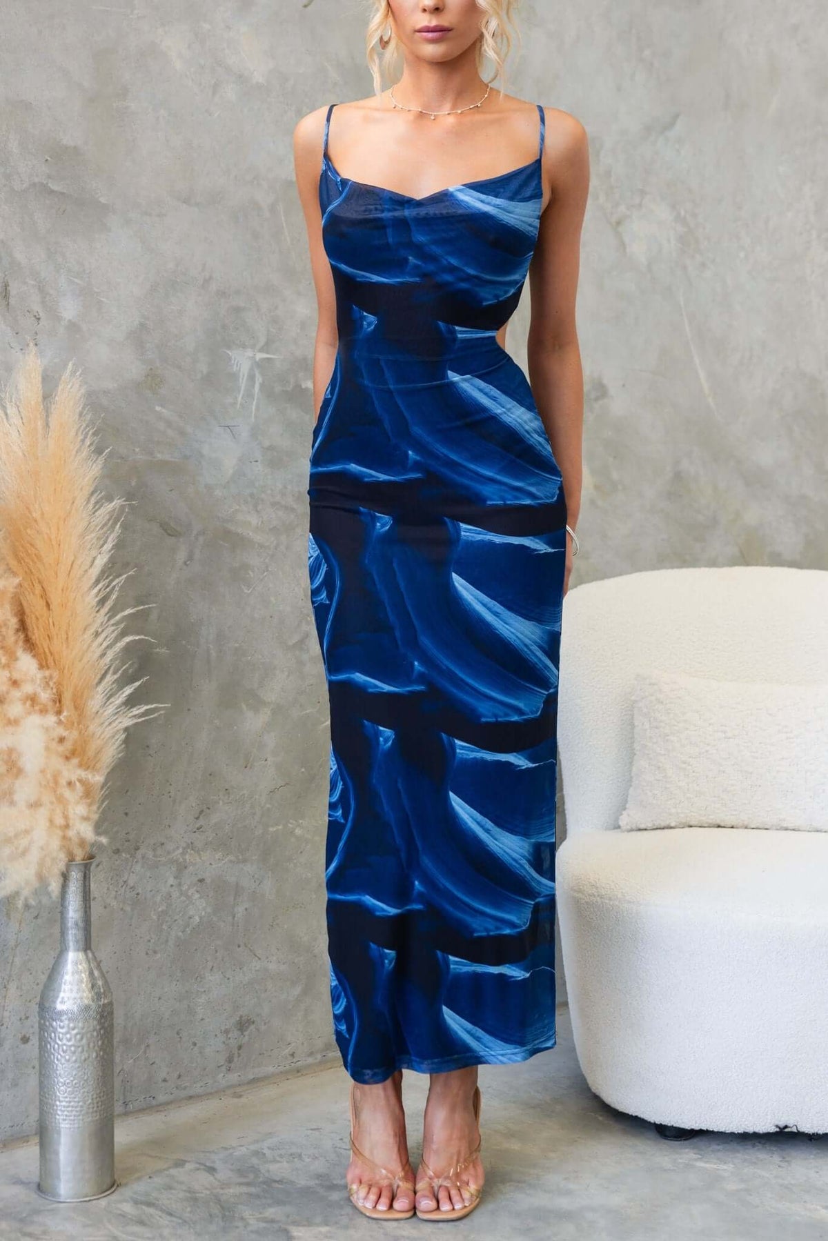 Kalena Maxi Dress featuring adjustable straps, cowl neckline, and a stylish cut-out back in blue mesh material.