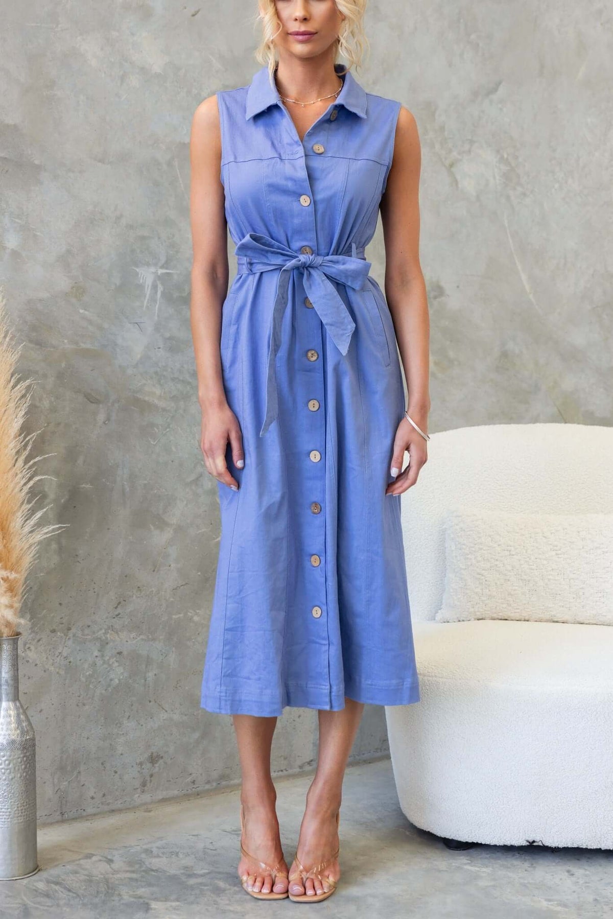 Kinston Denim Midi Dress in light blue, featuring button-up front, collar, removable tie, and pockets.