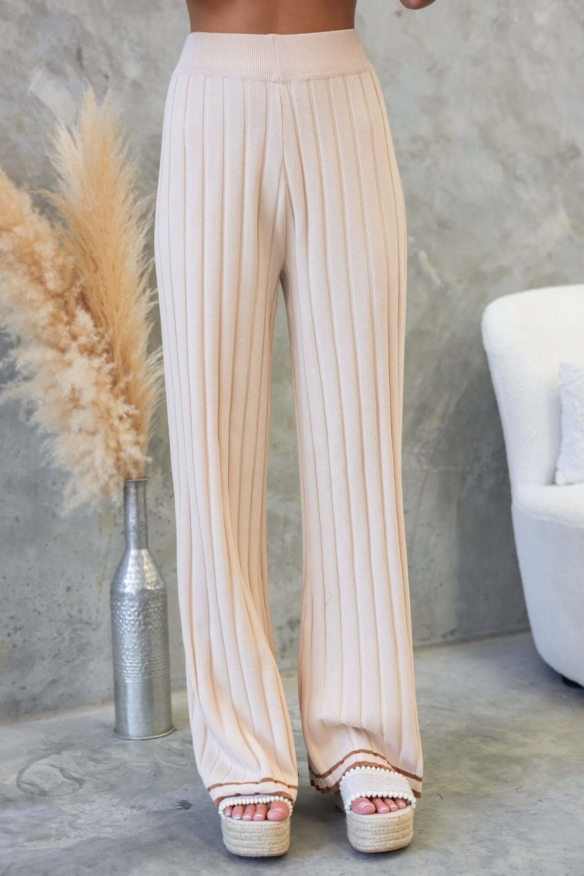 Jodie Pants featuring ribbed knit material, mid-high waist fit, and elastic waistband; perfect for a stylish, comfortable look.