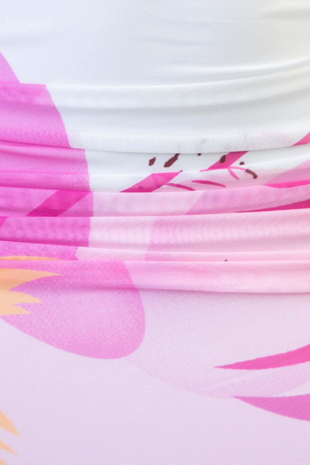 Close-up of the Pamona Maxi Dress showcasing the ruching and colorful mesh overlay in pink and white shades.