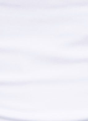 Close-up of soft white fabric with a gentle stretch, ideal for a bodysuit or casual wear.