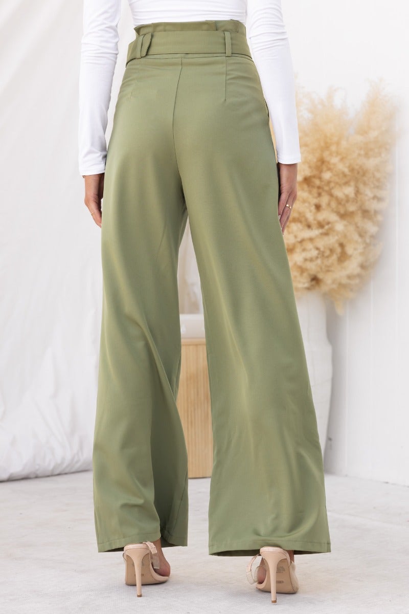 Back view of No Strings Pants featuring a paperbag waist, removable belt, and wide-leg fit in olive green.