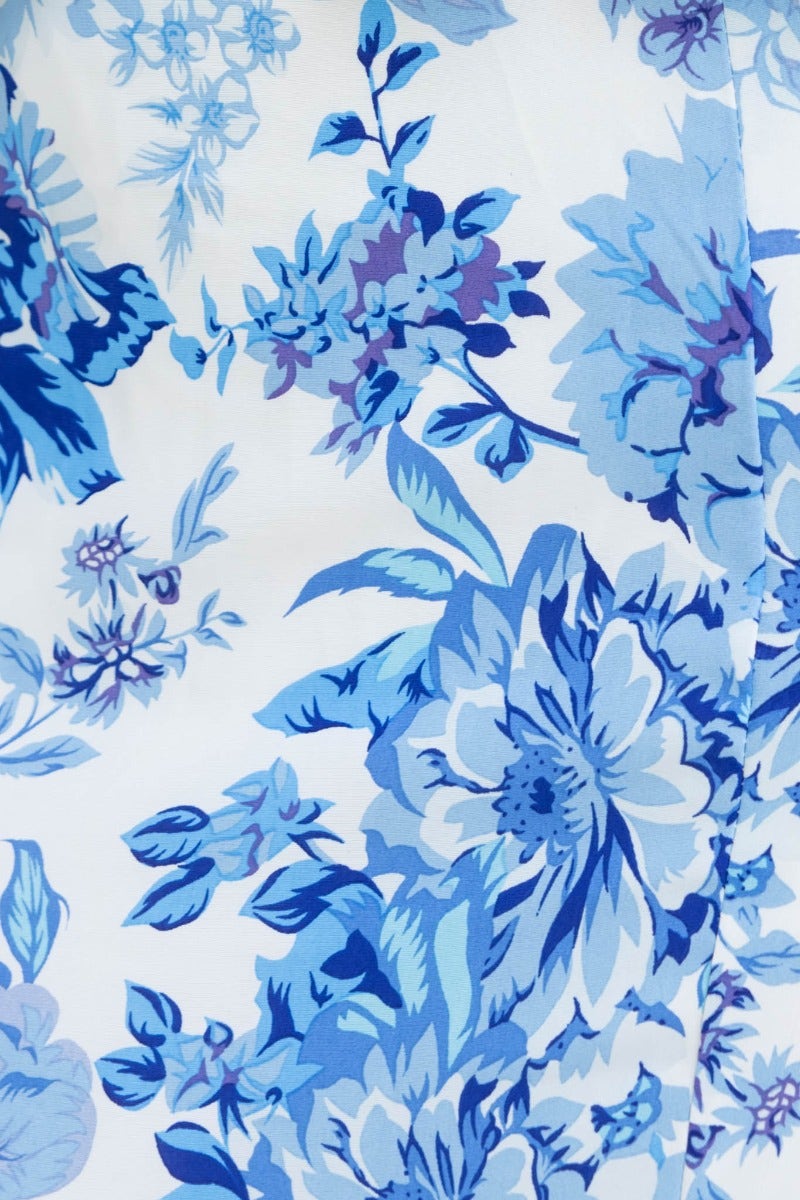 Close-up of blue floral print on Harto Maxi Dress featuring intricate flower designs.