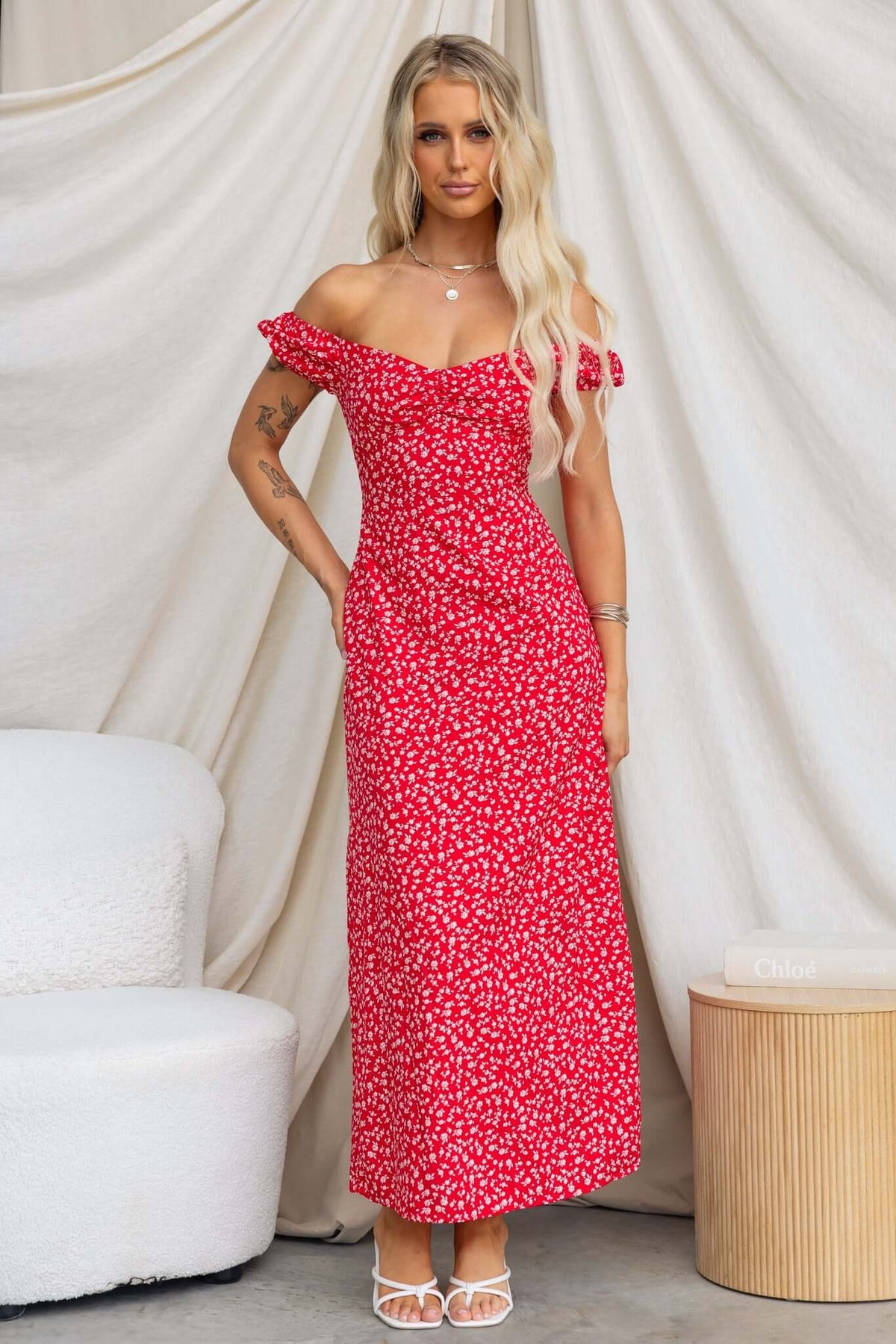 Frankle Maxi Dress in red floral print, featuring off-the-shoulder design, fitted silhouette, and stylish length.
