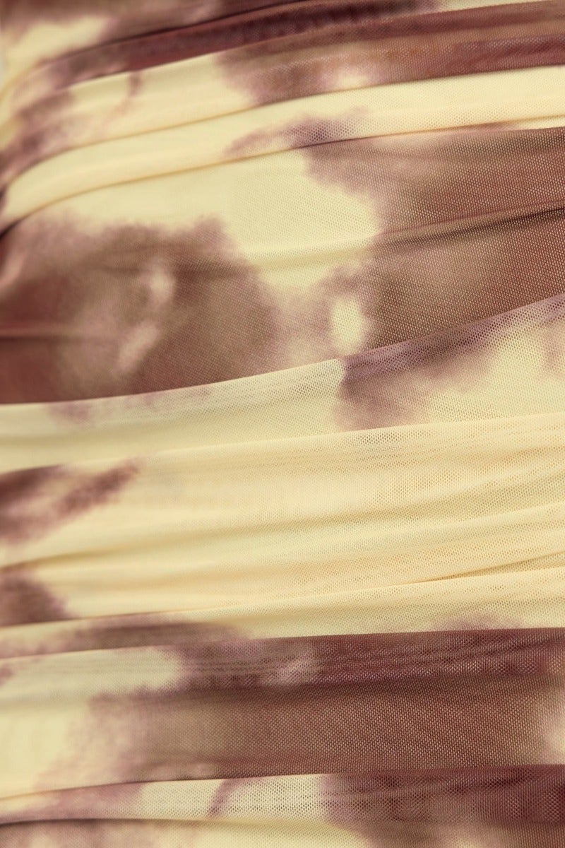 Close-up of multi-colour print fabric of Ravyn Maxi Dress, featuring elastic ruching detail and soft texture.